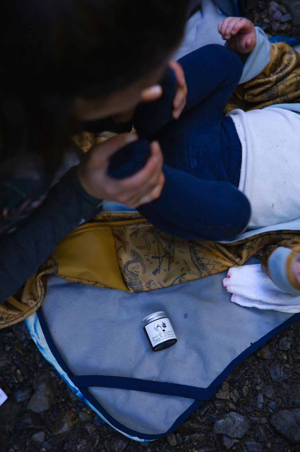 Nappy changes outdoors while hiking tramping with a baby in NZ with cloth nappies